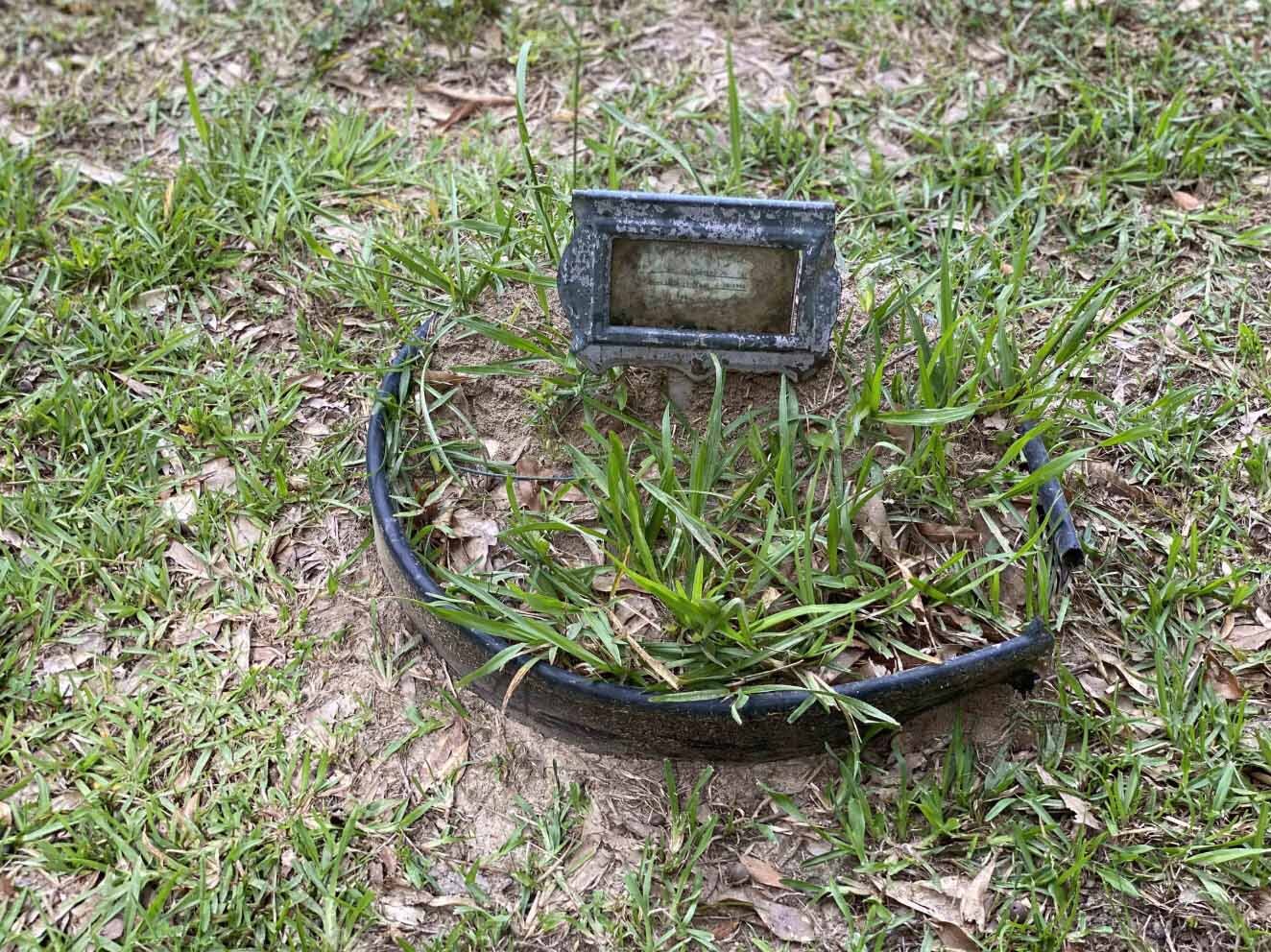 This 1994 grave in Onisha Burks Memory Gardens Cemetery in Canton is marked only with metal sign from the funeral home. Ann Marie Cunningham/MCIR