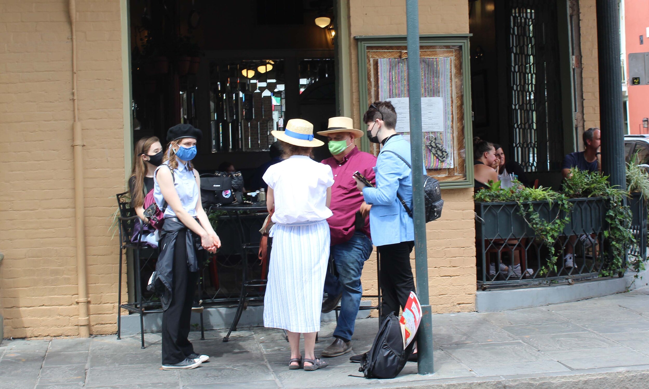 Members of MCIR's Justice Squad and Journalism Lab Reporter in Residence Ann Marie Cunningham interview author Frank Perez in New Orleans French Quarter. MacKenzie Moffat, MCIR Justice Squad