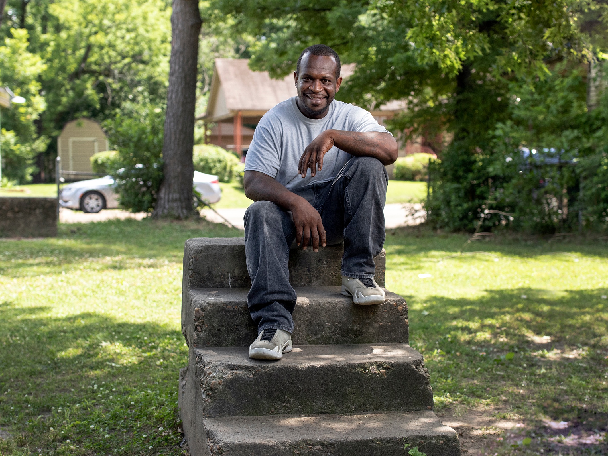 Marcellus Gray, 42, a local barber in Greenwood, Miss., is all too familiar with gun culture. He works to help kids shy away from street life.   Charles A. Smith/Mississippi Center for Investigative Reporting.