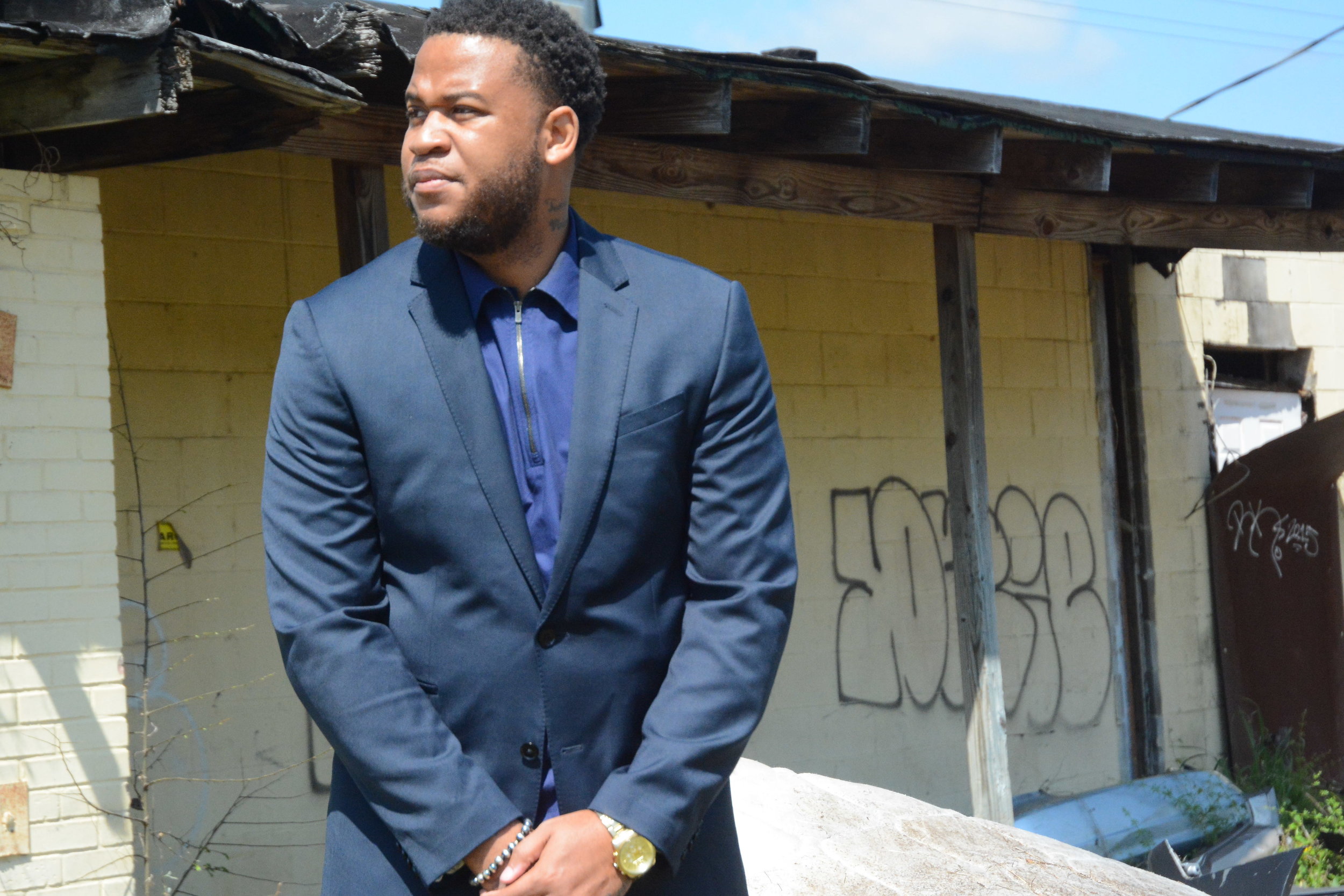 "In my neighborhood, if you made it past 18 you were blessed,” says educator, author and motivational speaker Tommie Mabry, 31, standing beneath an overpass in the midtown Jackson, Miss., community where he became street smart and a juvenile offender at the age of 12.   Justin Vicory/Mississippi Center for Investigative Reporting