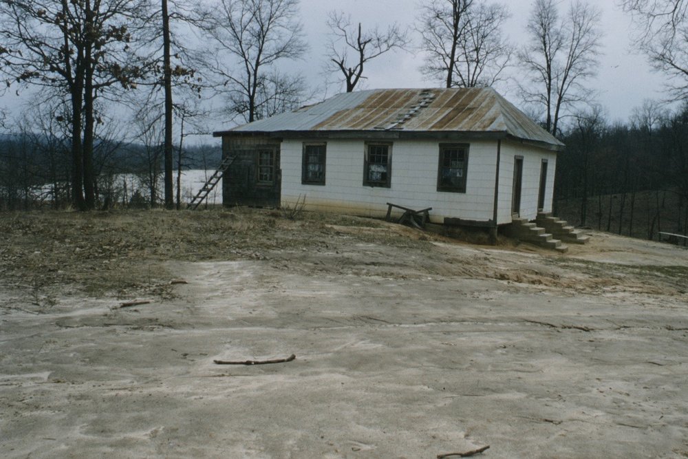 Outside of the rundown Hines Elementary School for black students in Benton County in 1956.     John E. Phay collection at the University of Mississippi Libraries Digital Collections