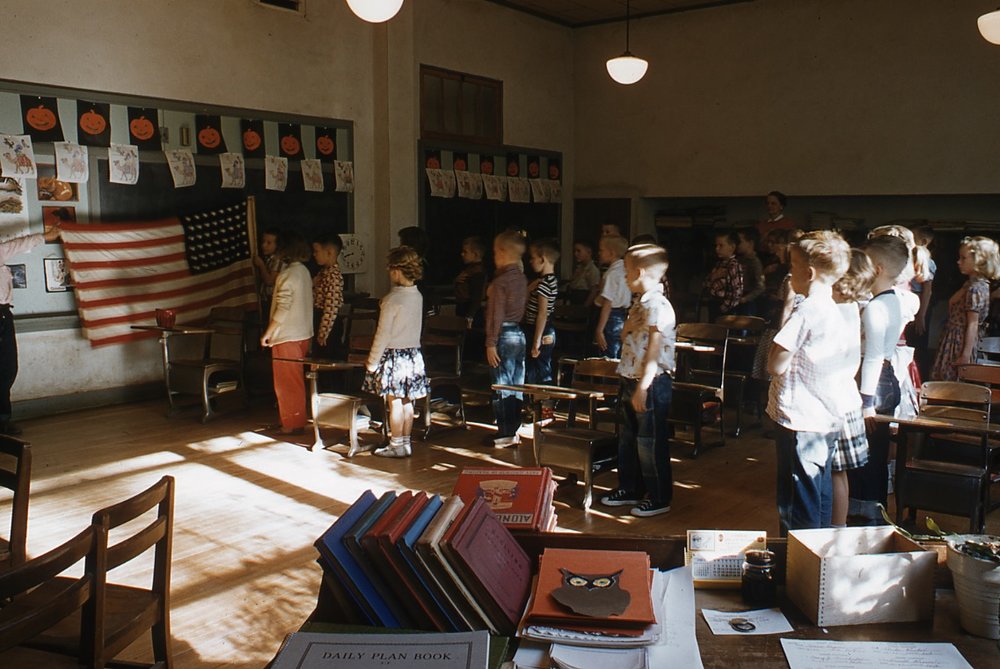 Second-grade students stand for the Pledge of Allegiance at the all-white Durant elementary school in 1955.   John E. Phay collection at the University of Mississippi Libraries Digital Collections